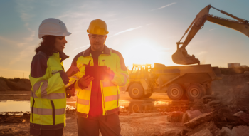 a construction team reviewing worksite